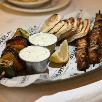 Suvlaki signature dishes Chicken Souvlaki Pita
Horiatiki
Chicken Skewer